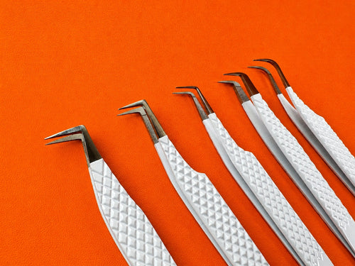 Fiber Tip Volume Tweezers
